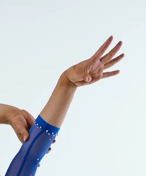 Gymnastics athlete’s hands in a poised position – Boise State Gymnastics