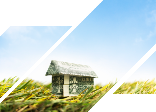 Origami house made from a dollar bill