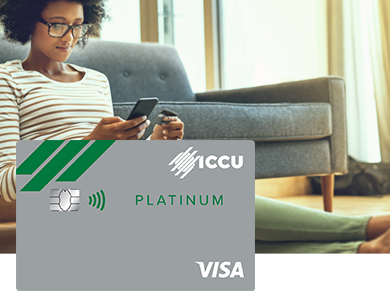 Women on phone with an iccu credit card